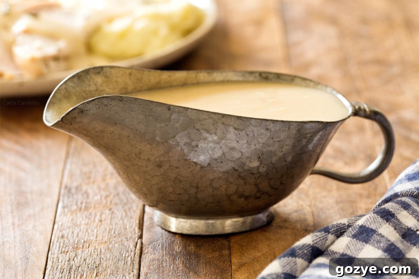 Homemade Turkey Gravy from Pan Drippings 5 Turkey gravy in pewter gravy boat
