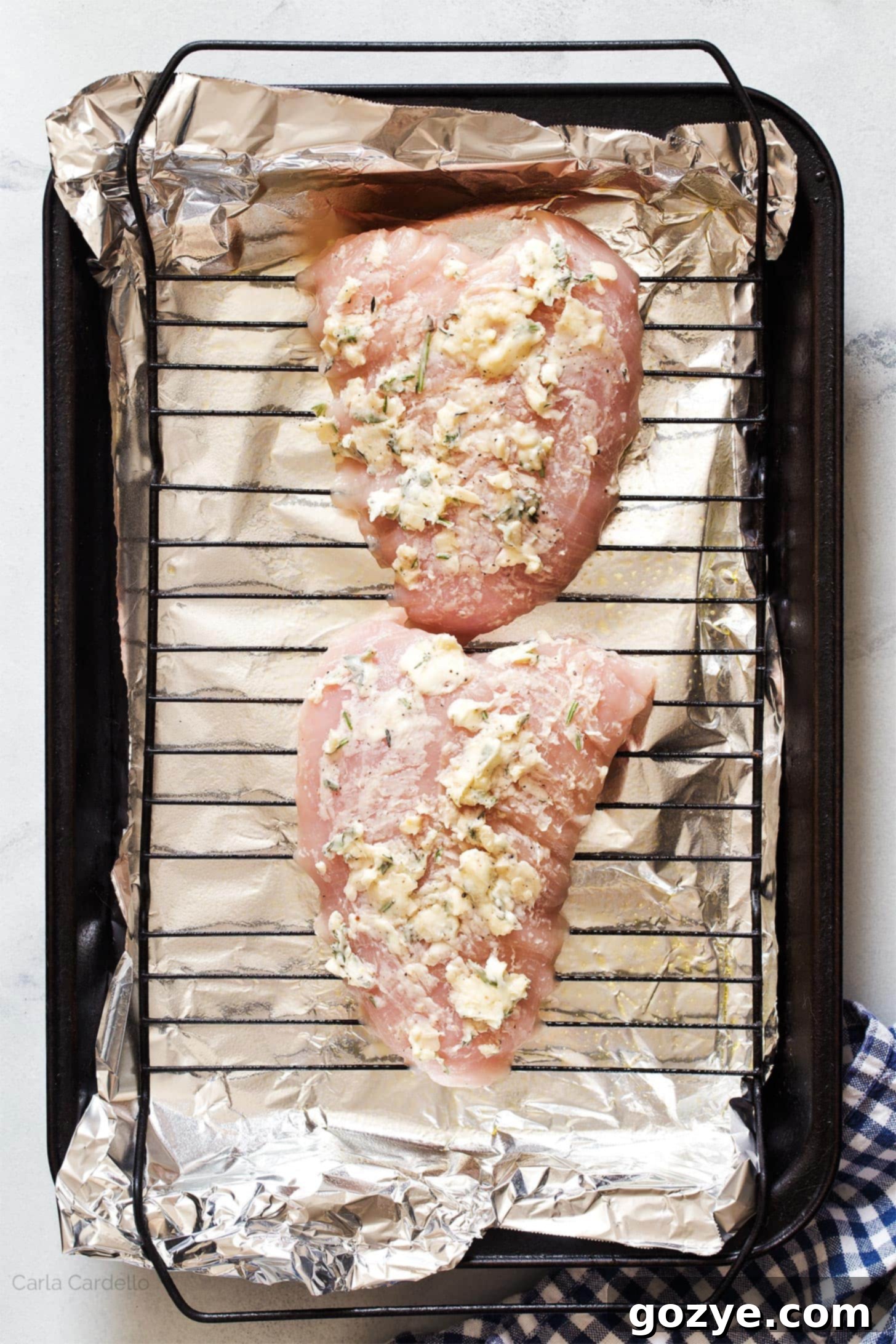 Turkey tenderloin generously rubbed with herb butter mixture