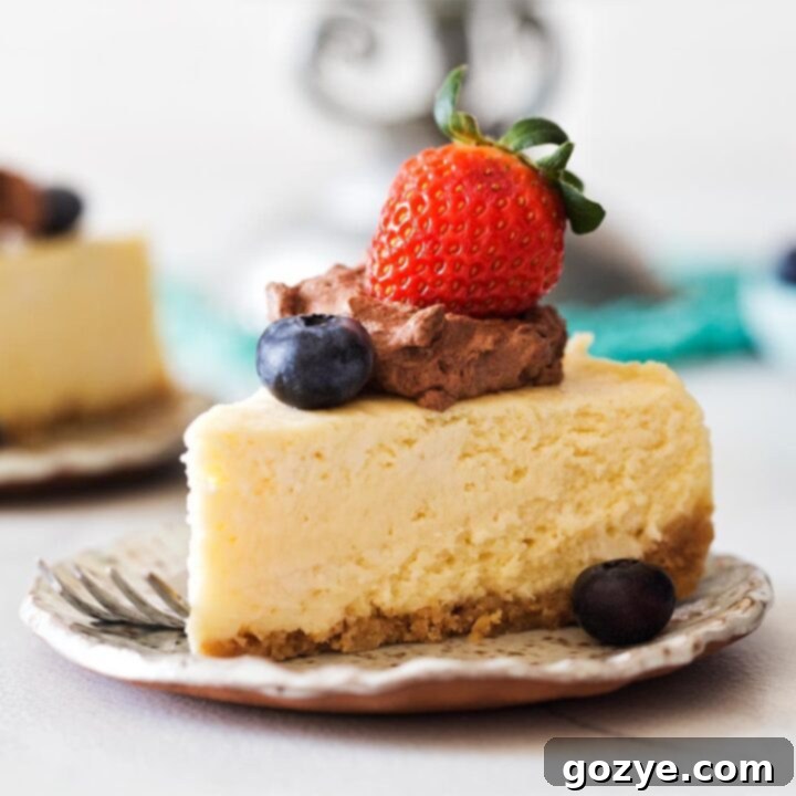 A delicious slice of Instant Pot Cheesecake, ready to be enjoyed.