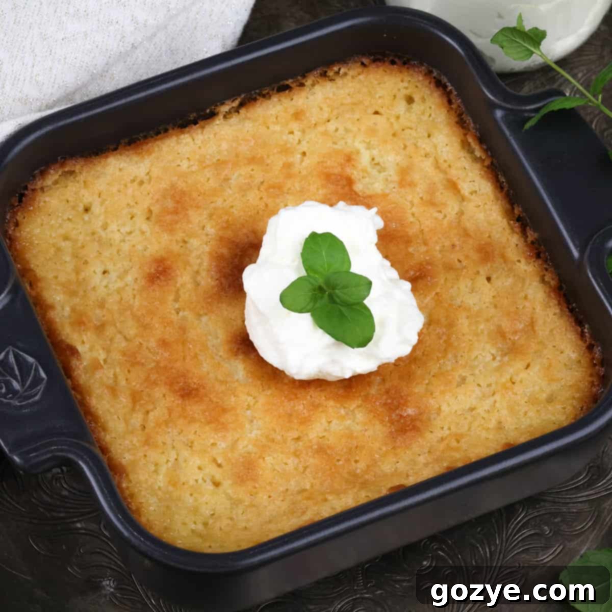 A slice of mini buttermilk pie with a creamy filling.