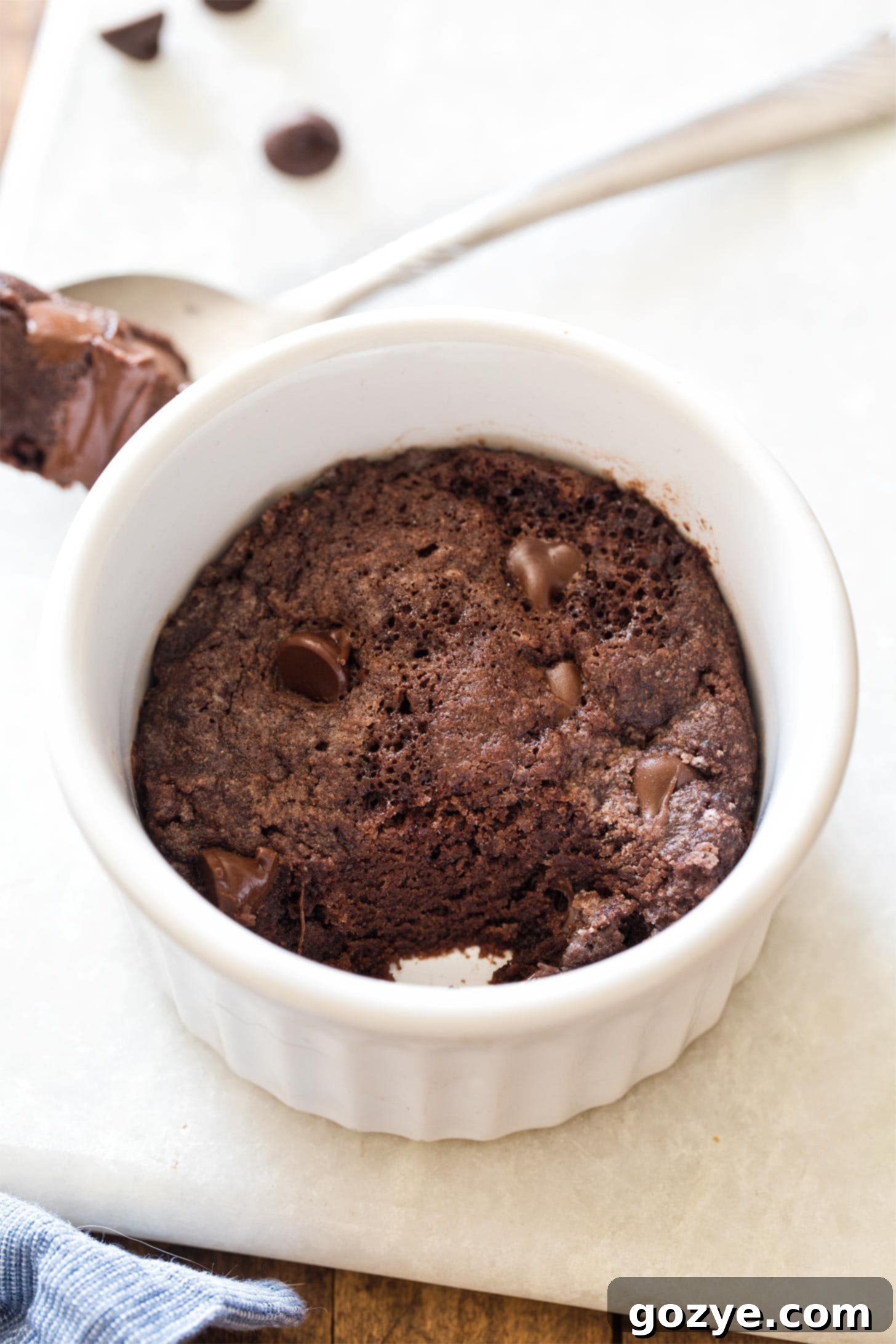 Microwave Brownie in ramekin with bite taken out