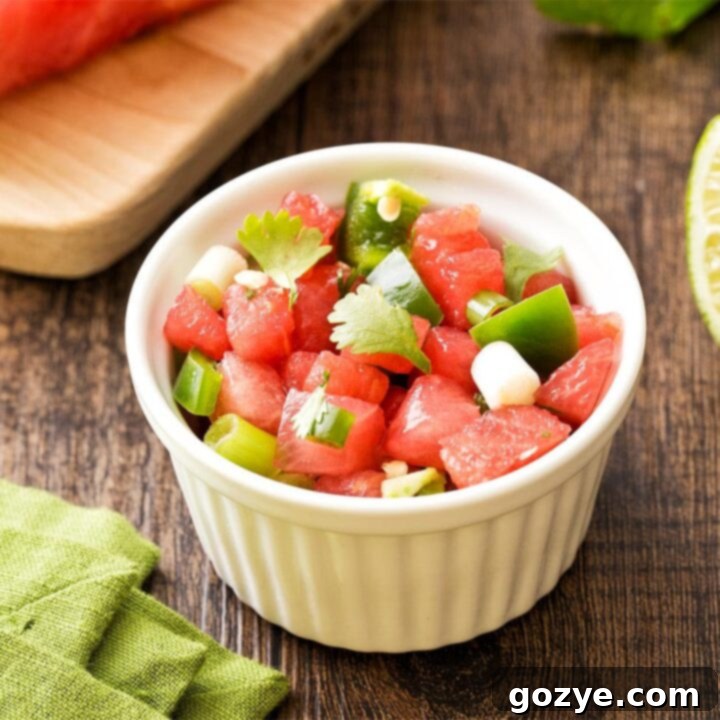 Watermelon fruit salsa in small white bowl, ready to be served