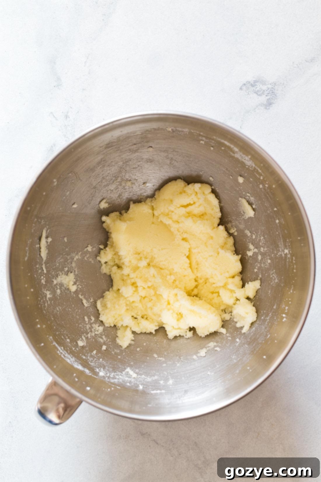 Making pumpkin bread dough in a bowl