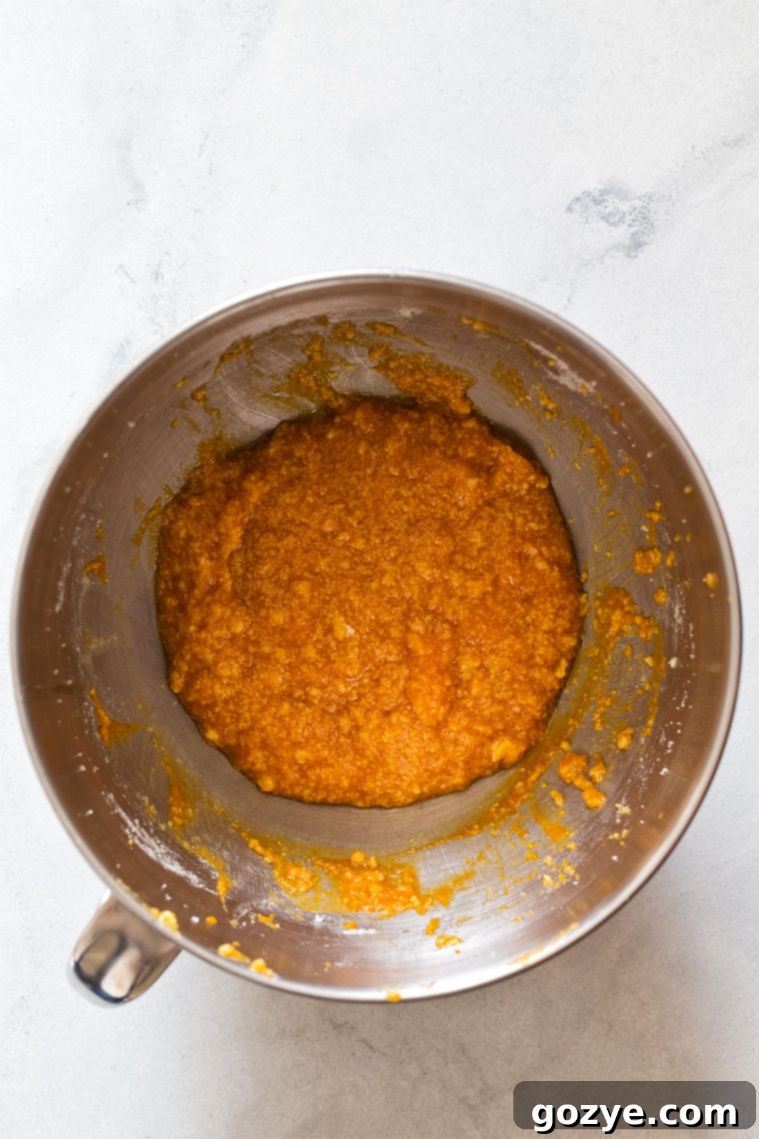 Mixing pumpkin muffin batter in a stand mixer