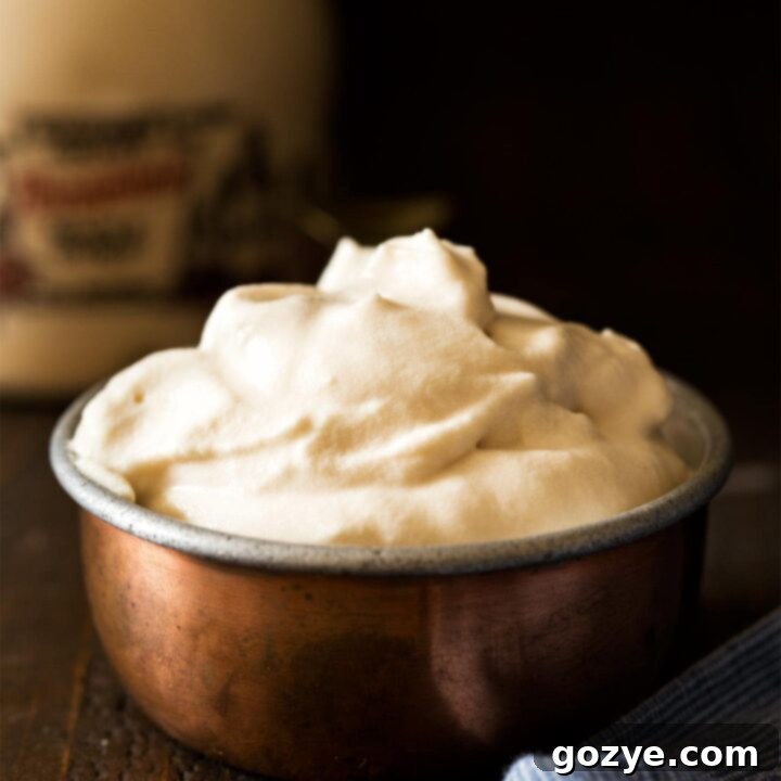 Maple Whipped Cream in a copper cup, ready to be enjoyed