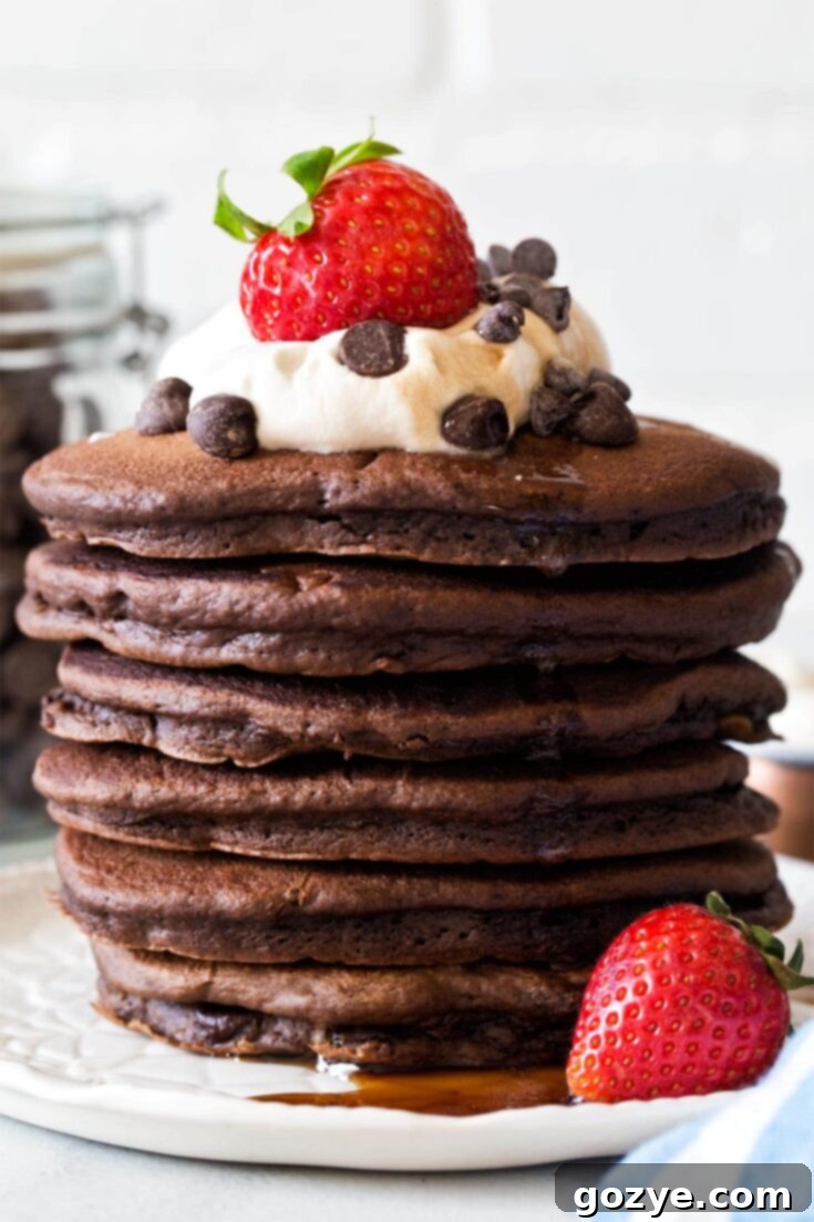 Pin this fluffy chocolate pancakes recipe for later!