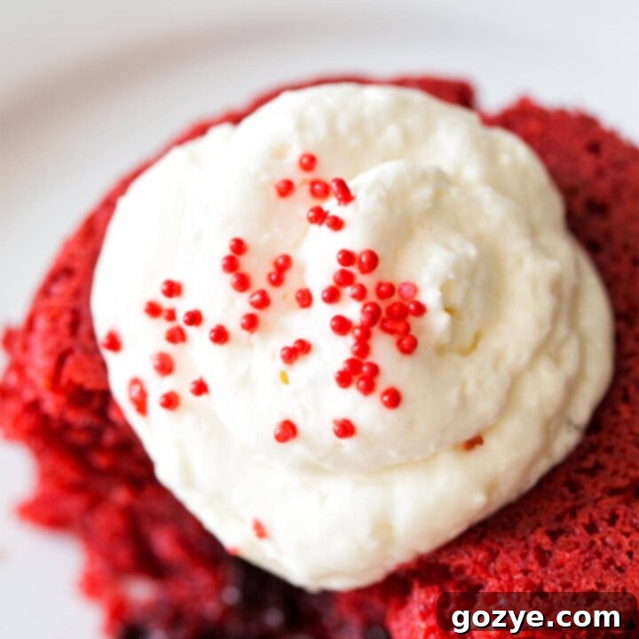 Cream Cheese Whipped Cream on top of red velvet cake