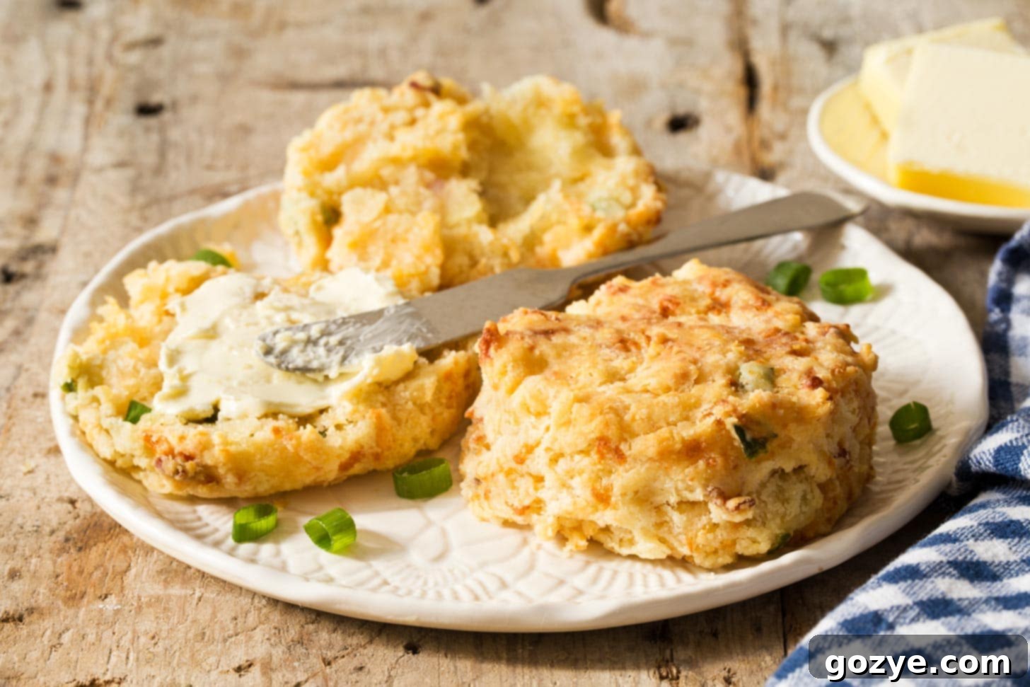 Just Enough Biscuits 8 Small Batch Biscuits on white plate with butter
