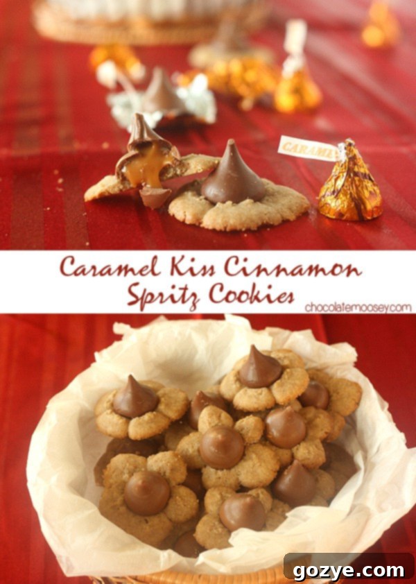 A festive platter of golden-brown Caramel Kiss Cinnamon Spritz Cookies, each topped with a melted caramel Hershey's Kiss, perfect for Christmas baking.