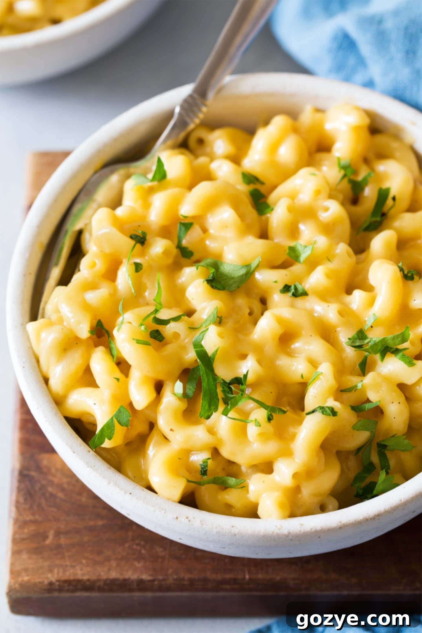 Close up of mac and cheese for two in white bowl