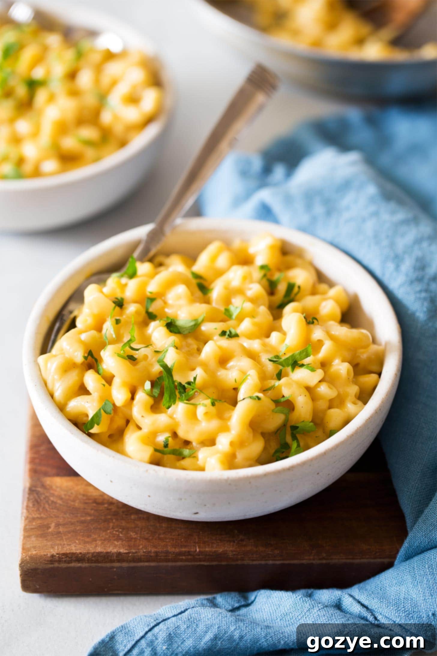 White bowl of mac and cheese for two