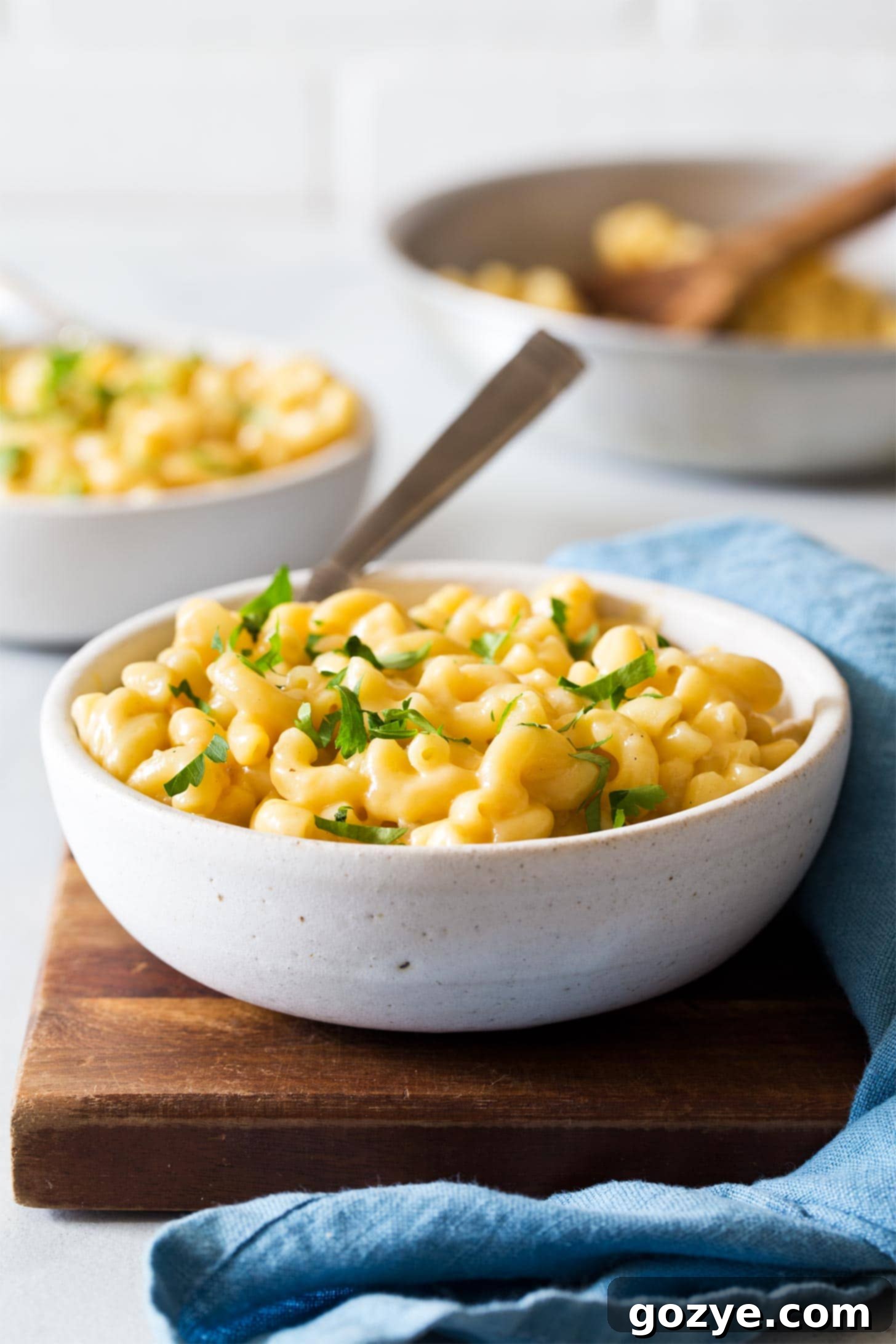 Mac and Cheese for 2 with fork in white bowl