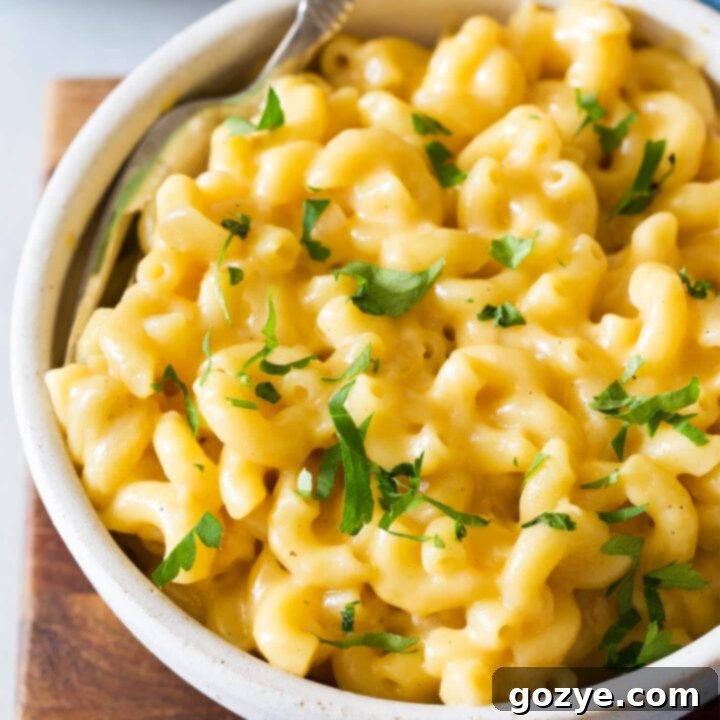 Close up of mac and cheese for two in white bowl