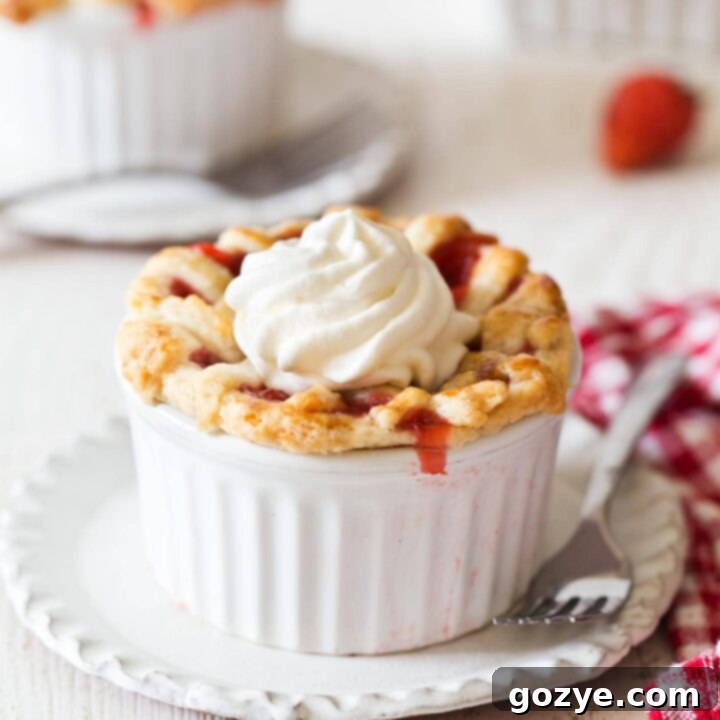 Mini Strawberry Pies in ramekins with whipped cream