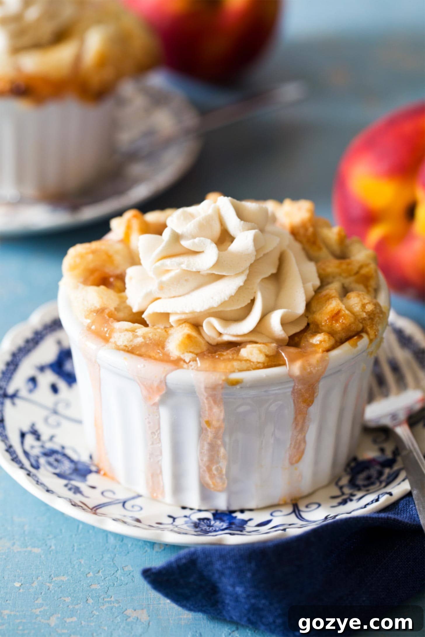 Mini peach pies on blue plate