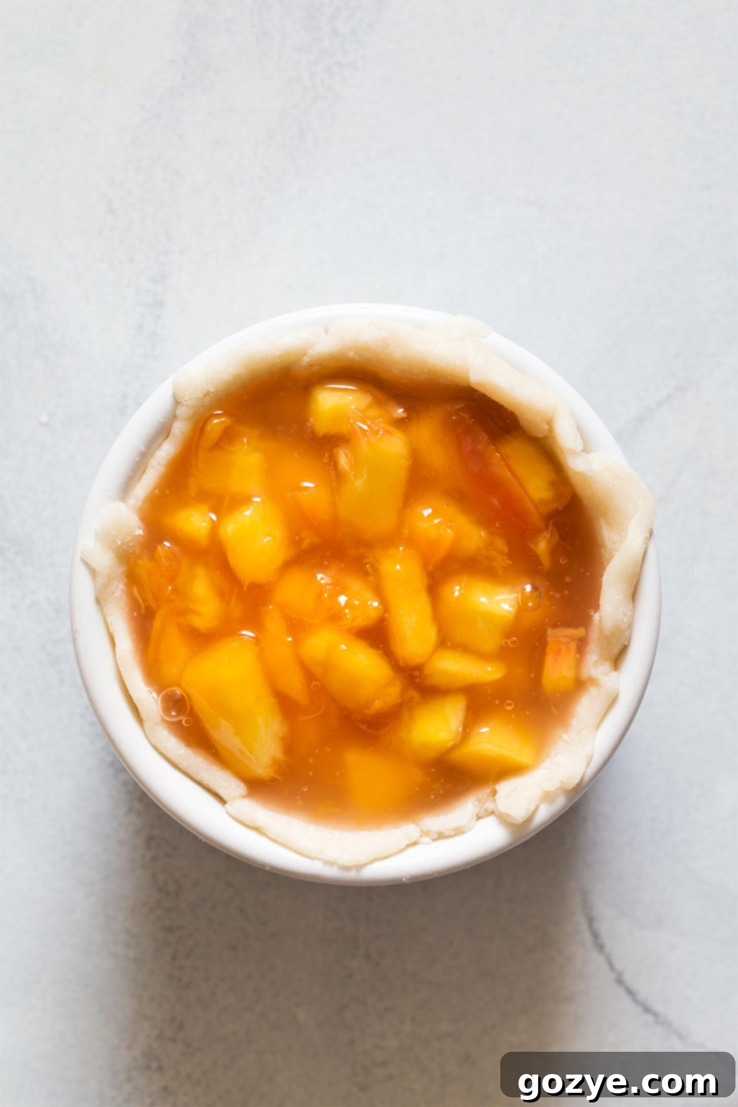 Adding peach pie filling to mini pies