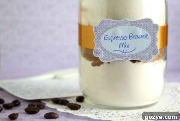 Layered ingredients for Espresso Brownie Mix in a glass jar