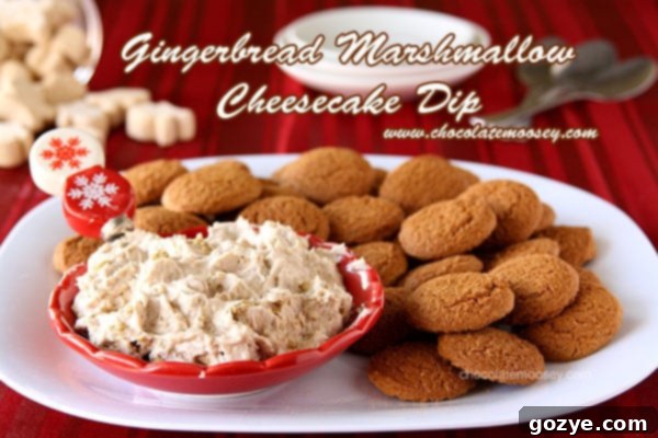 Creamy Gingerbread Marshmallow Cheesecake Dip in a bowl, ready to serve with dippers.