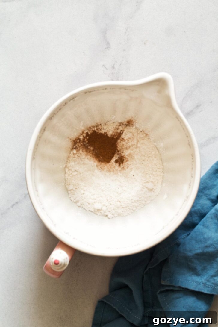 Dry ingredients in mixing bowl for pancakes for two