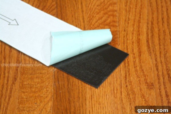 Peeling the backing off vinyl planks