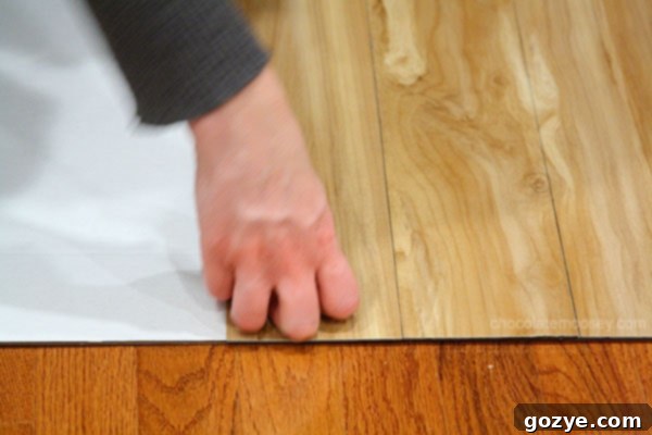 Adding more vinyl planks to the photography board