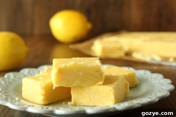 Creamy Lemon Fudge from www.chocolatemoosey.com Assorted squares of creamy lemon fudge, some showing a slightly paler natural yellow.