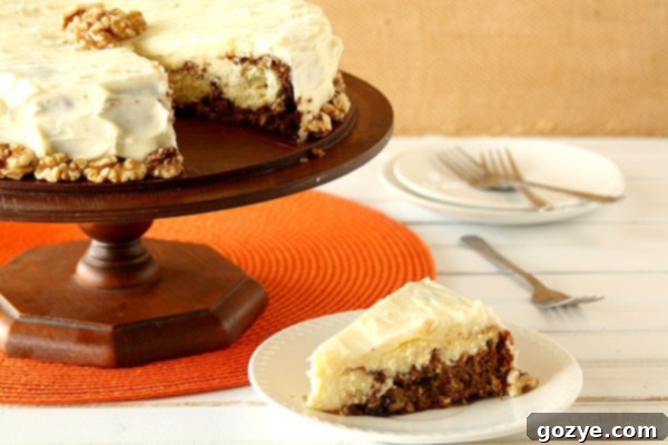Slice of Carrot Cake Cheesecake with Cream Cheese Frosting
