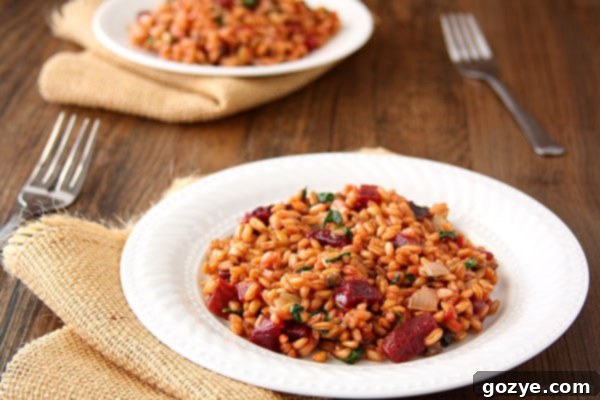 Ingredients for Beet, Spinach, and Goat Cheese Farro Risotto, including cooked beets, fresh spinach, and crumbled goat cheese.