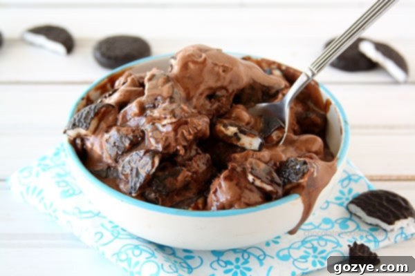 A beautifully presented bowl of Peppermint Patty Ice Cream, garnished with a whole peppermint patty, ready to be enjoyed.