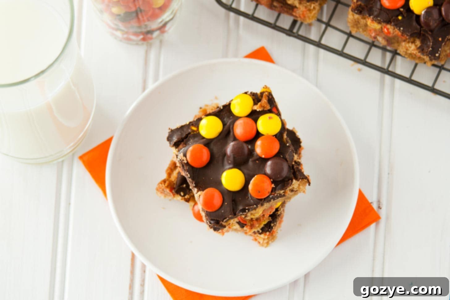 Recipe for peanut butter blondies on a white plate