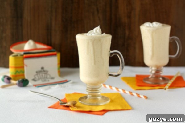 Dulce De Leche Milkshakes with Coconut Milk Whipped Cream, a perfect sweet treat for Cinco de Mayo celebrations or any warm day.