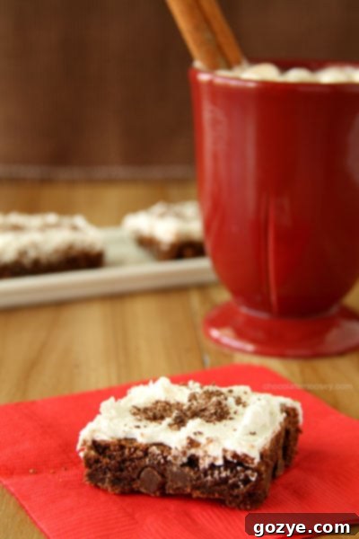 Decadent Brownie Cookie Mashup 4 Mexican Hot Chocolate Brownie Cookie Bars with marshmallow frosting and grated chocolate