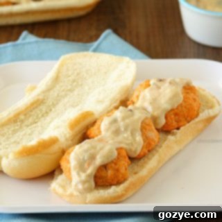 Buffalo Chicken Meatball Subs with Garlic Blue Cheese Sauce on a platter