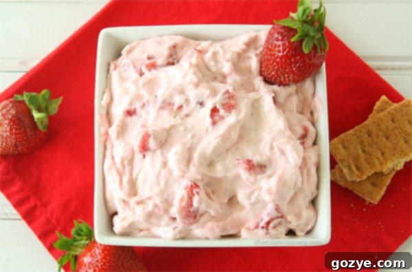 Strawberry cream cheese dip in white square bowl
