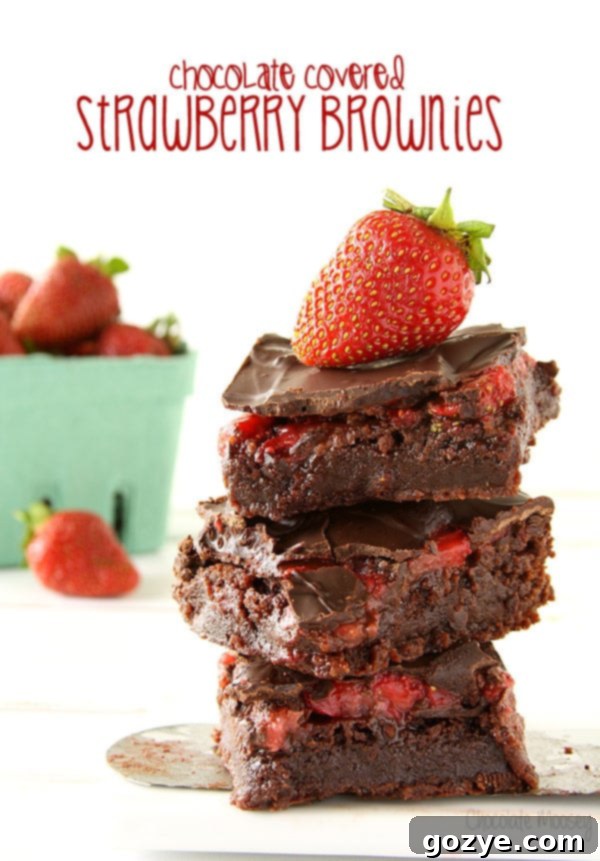 Fudgy Chocolate Covered Strawberry Brownies with fresh berries and chocolate glaze