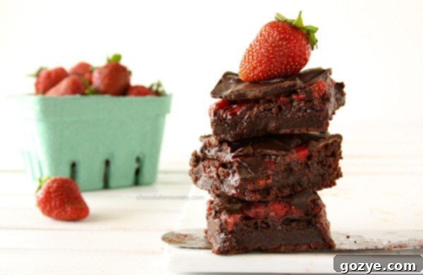 Close-up of freshly baked Chocolate Covered Strawberry Brownies on a wire rack