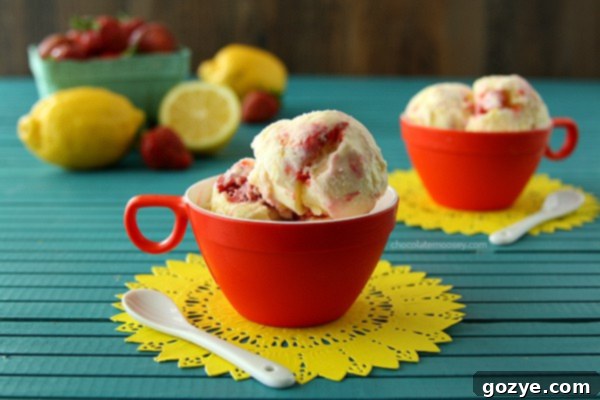 Delicious Homemade Strawberry Lemonade Ice Cream Swirled with Fresh Berries