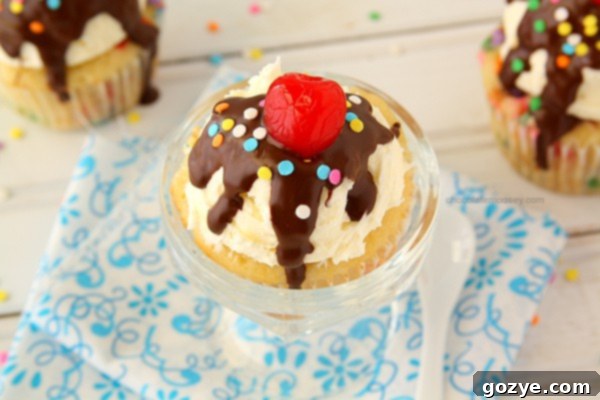Funfetti Ice Cream Sundae Cupcakes | A close-up of a Funfetti cupcake with sprinkles mixed into the cake batter.