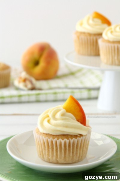 Mixing the peach cupcake batter with preserves