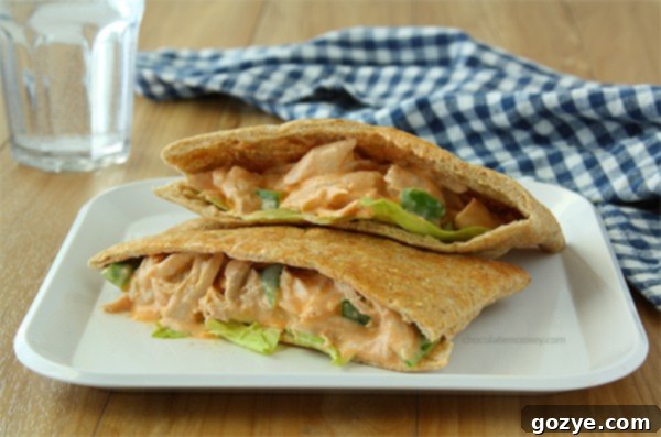 Creamy Buffalo Chicken Salad Sandwiches served in pita pockets