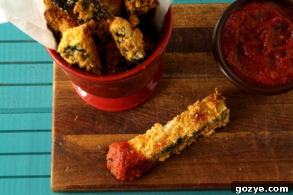 Baked Zucchini and Eggplant Fries on a Baking Sheet