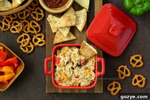 Creamy Chicken Fajita Dip with fresh bell peppers ready for dipping