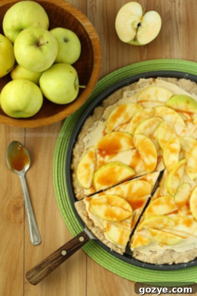 Close-up of freshly sliced apples on Caramel Apple Sugar Cookie Pizza