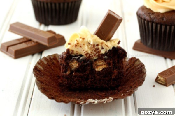 Baked Kit Kat Cupcakes before frosting, showing slight variations in top surface