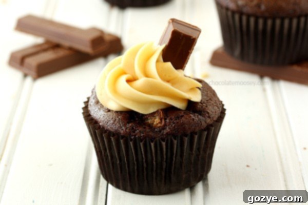 Kit Kat sticking out of a cupcake, showing the hidden candy inside