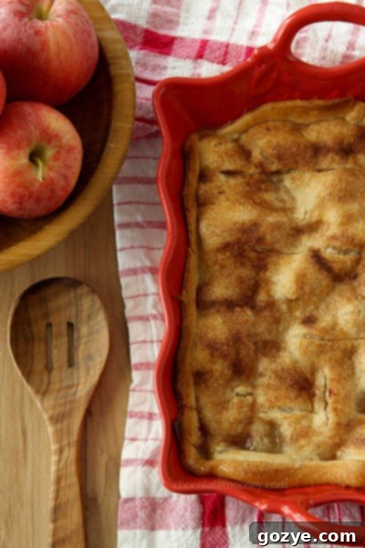 Close-up of Apple Dumpling Cobbler with flaky crust