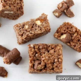 Twix Caramel Chocolate Crispy Bars 4 Chocolate Caramel Twix Rice Crispy Treats - a delicious no-bake dessert.