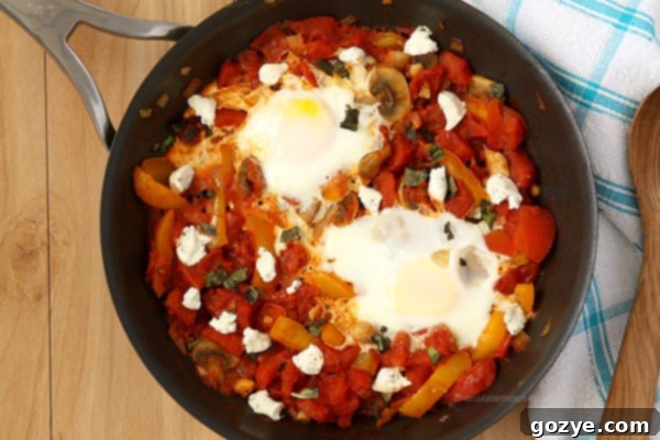 Shakshuka (Eggs Poached In Tomato Sauce)