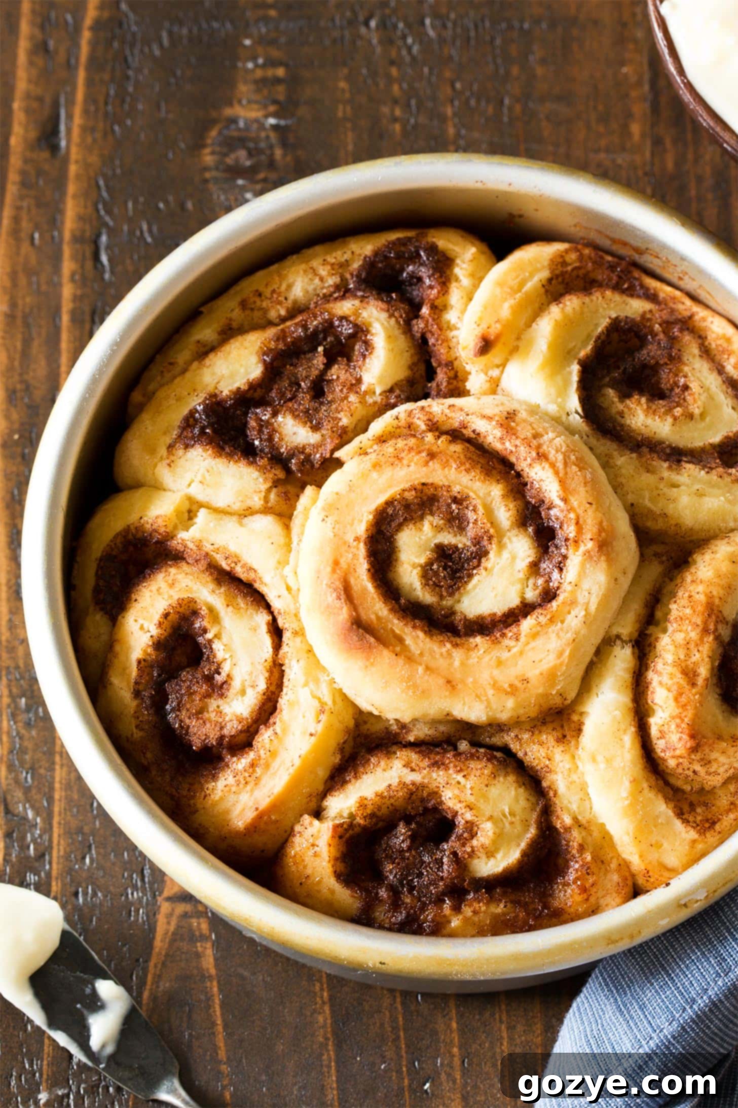 Quick & Cozy Cinnamon Rolls 3 Close up of small batch cinnamon rolls in round pan