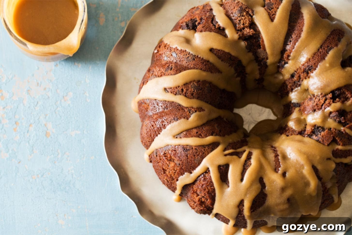 Rich caramel glaze prepared and ready for use on various desserts, showcasing its golden color